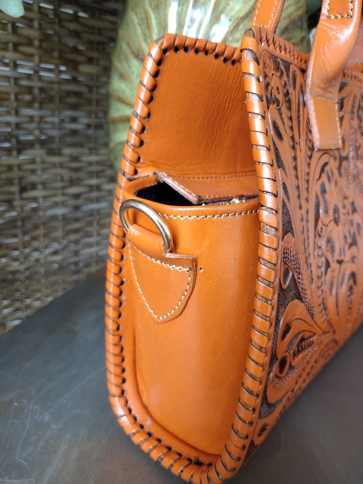 Floral shoulder purse leather natural/antique with shoulder strap.