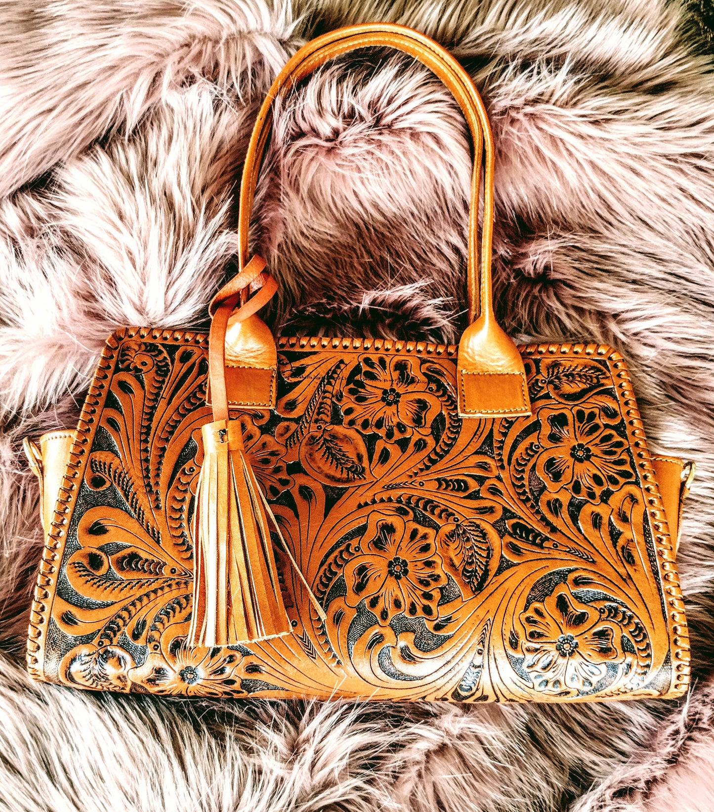 Floral shoulder purse leather natural/antique with shoulder strap.