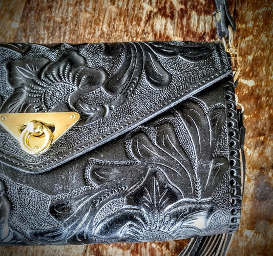 Clutch purse black with shoulder strap.