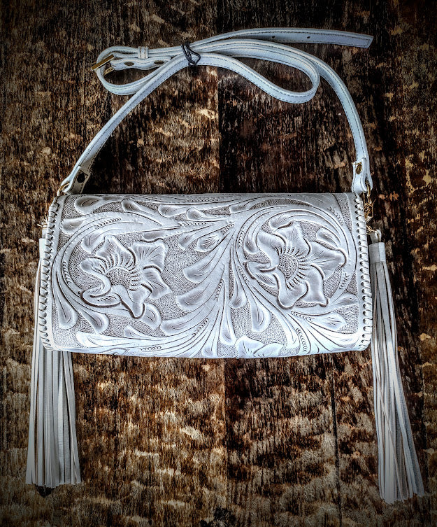 Clutch purse white/wash with shoulder strap.