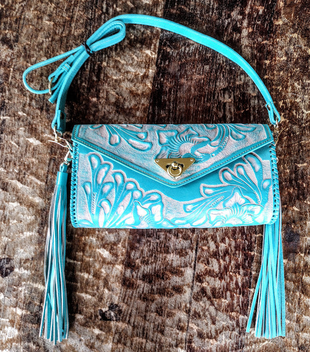 Clutch purse blue/Wash with shoulder strap.