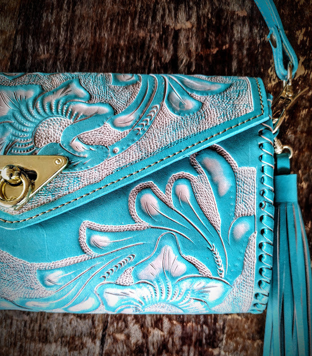 Clutch purse blue/Wash with shoulder strap.