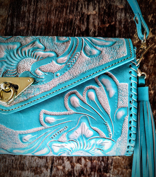 Clutch purse blue/Wash with shoulder strap.