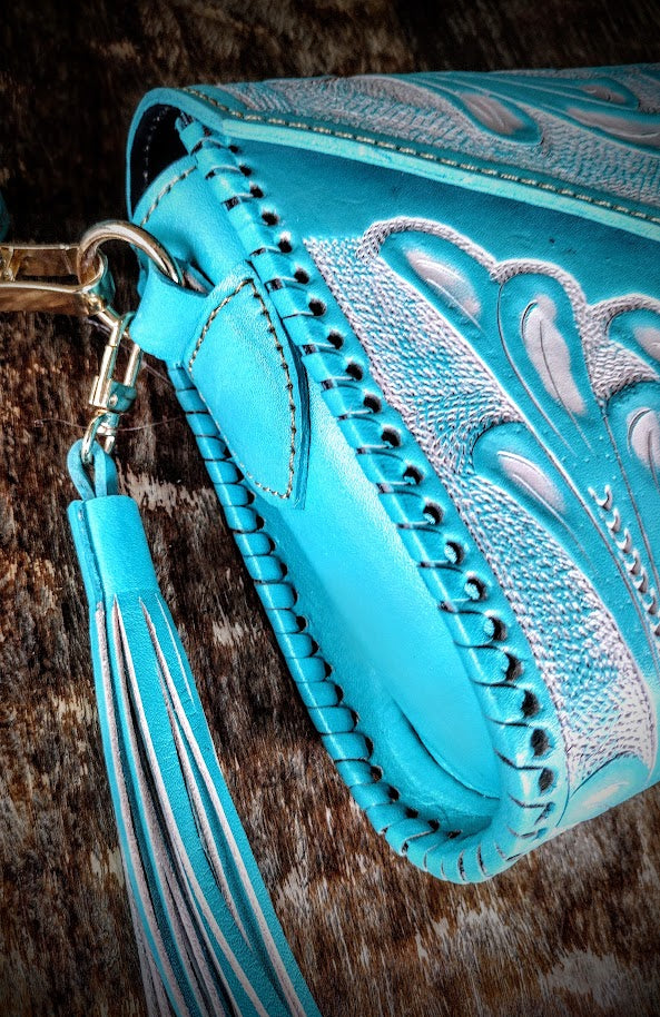 Clutch purse blue/Wash with shoulder strap.