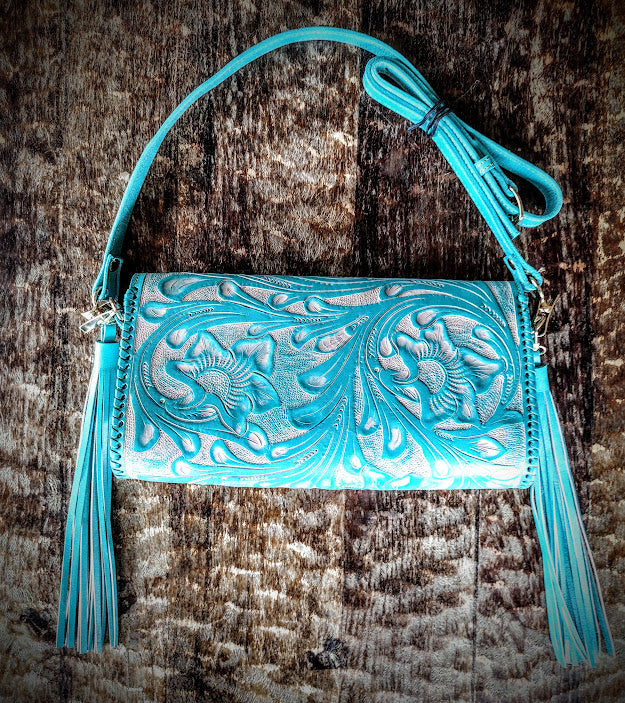 Clutch purse blue/Wash with shoulder strap.