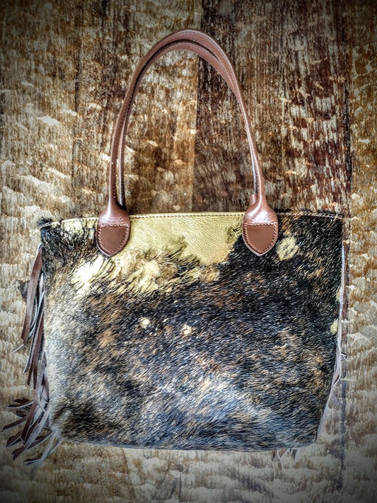 Cowhide hand bag.