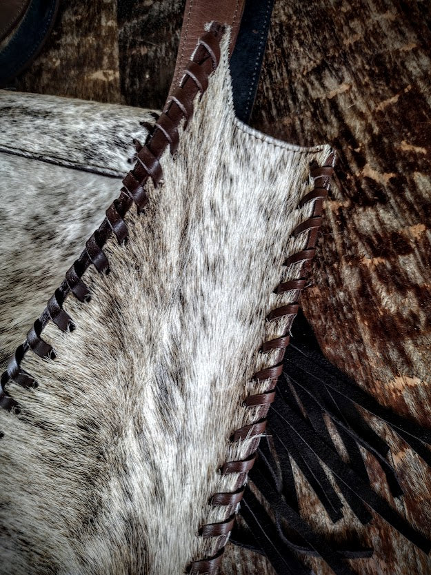 Cowhide beige and brown handbag.