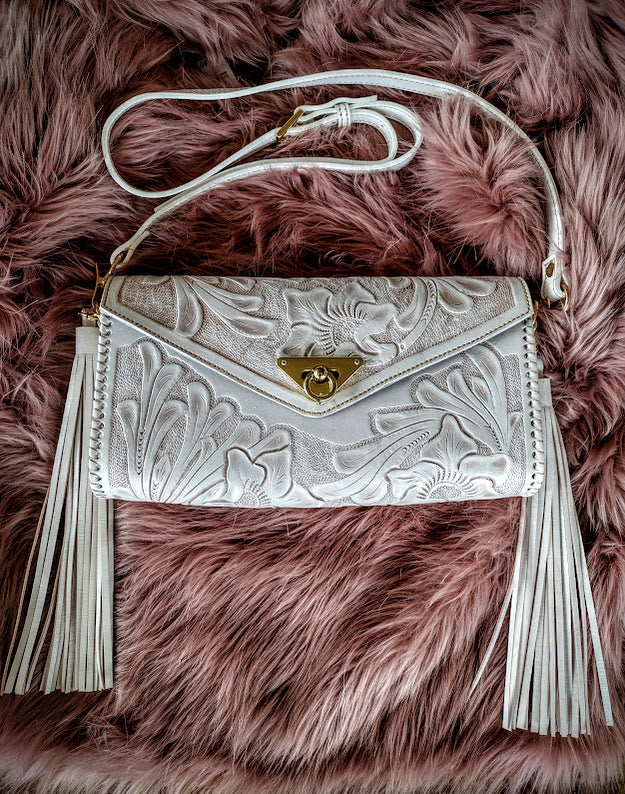 Clutch purse white/wash with shoulder strap.