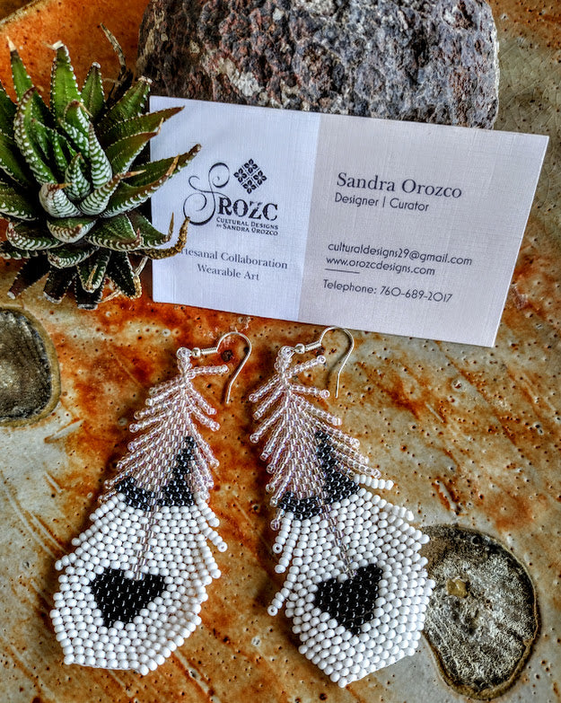 Realistic white/black feathers beaded earrings