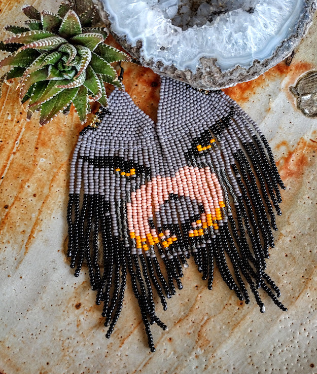 Wolf beaded earrings.