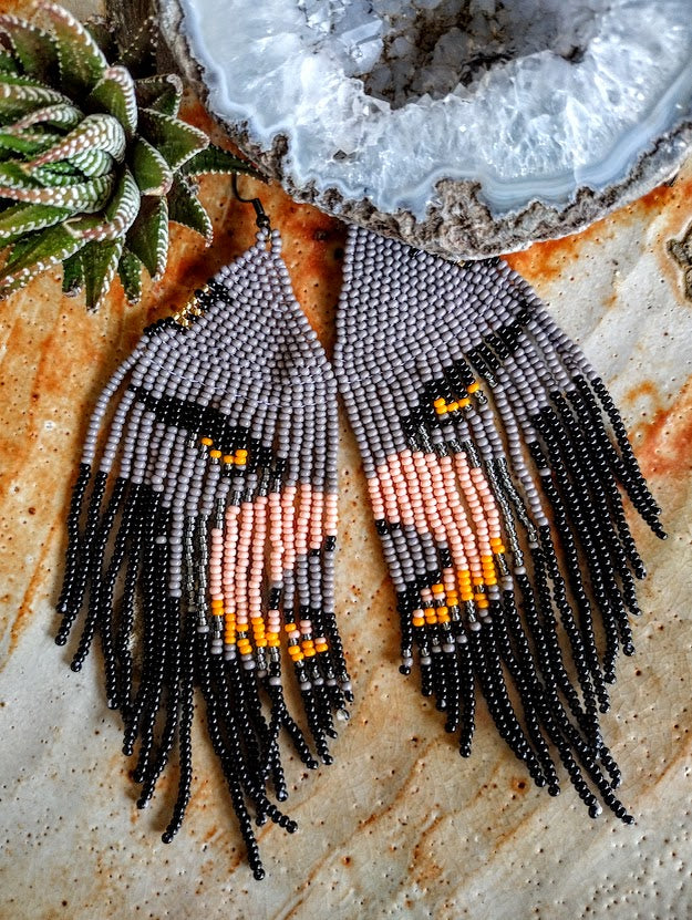 Wolf beaded earrings.