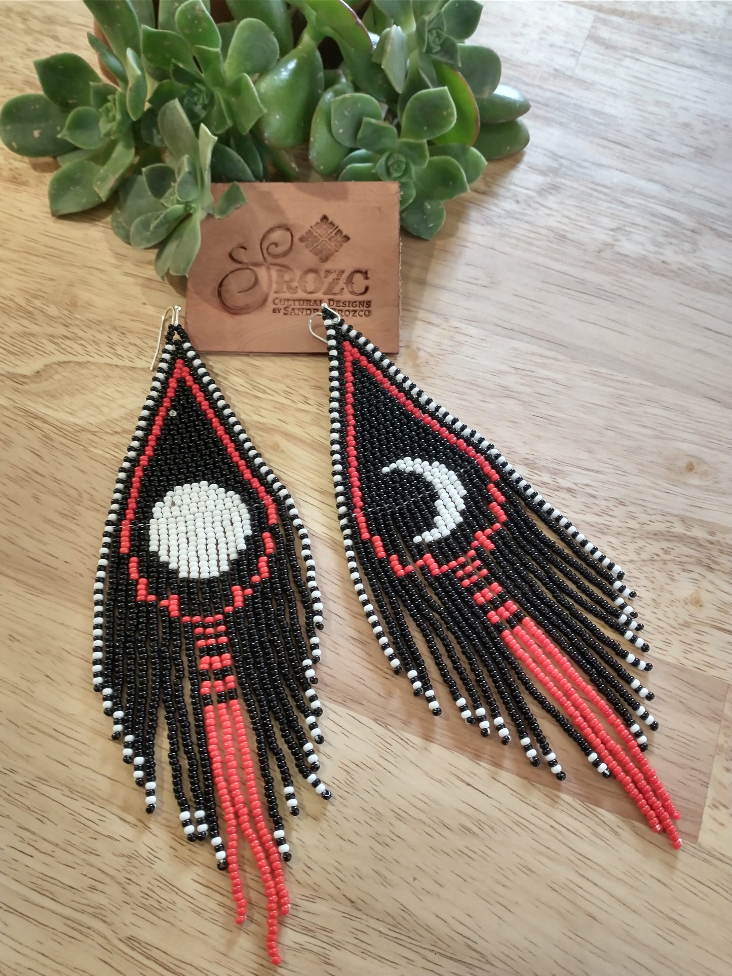 full and half-moon long beaded earrings.