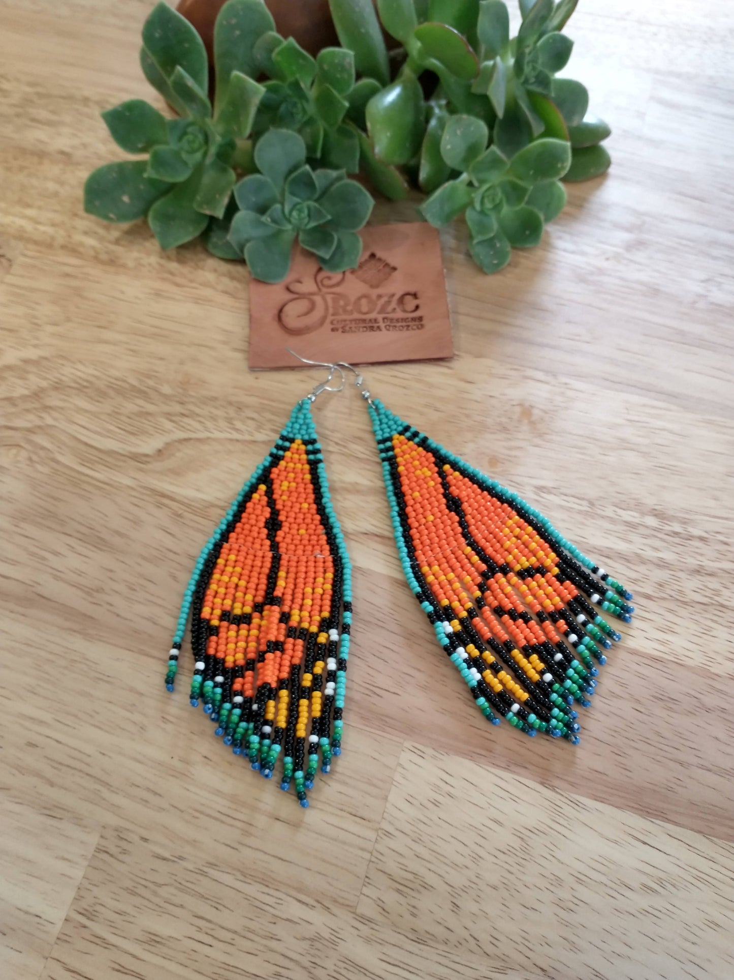 Monarch/ Torquoise butterfly winds beaded earring