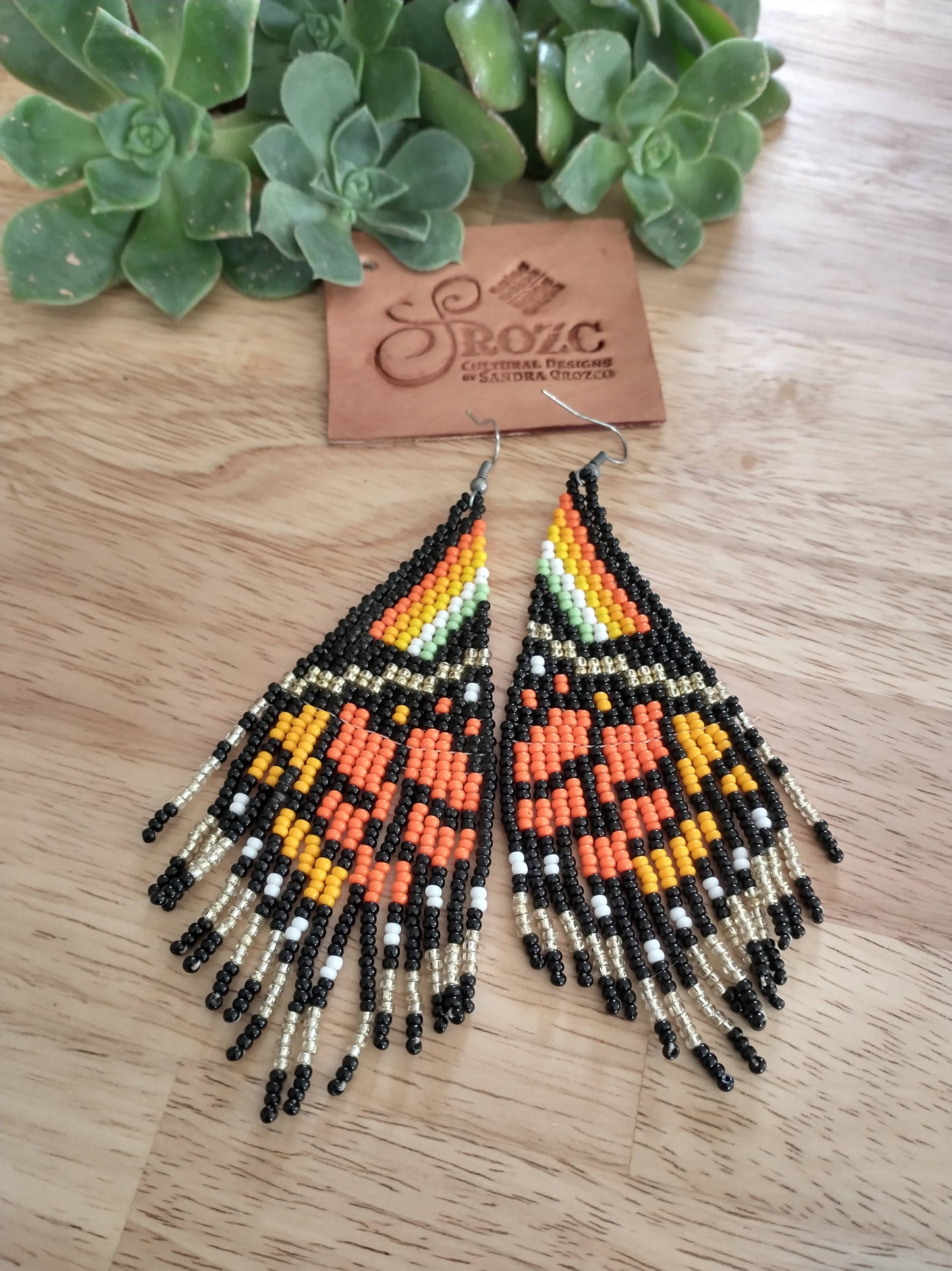 Monarch/ gold butterfly winds beaded earring
