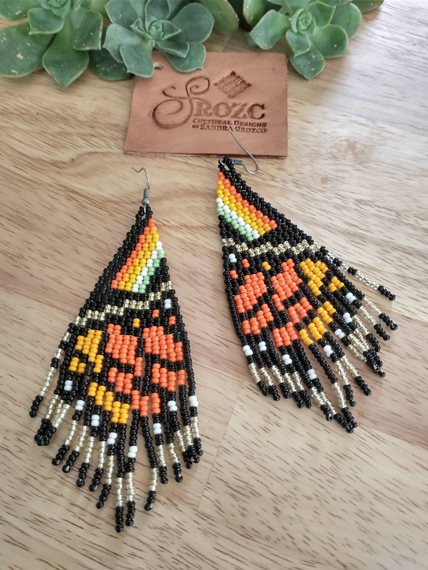 Monarch/ gold butterfly winds beaded earring
