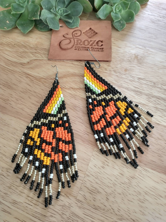 Monarch/ gold butterfly winds beaded earring