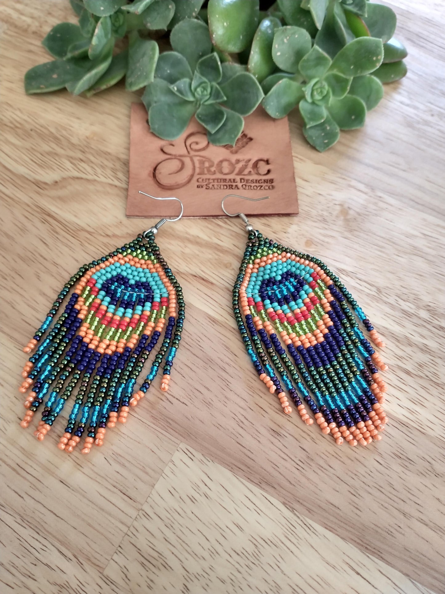 Peacock feather beaded earrings