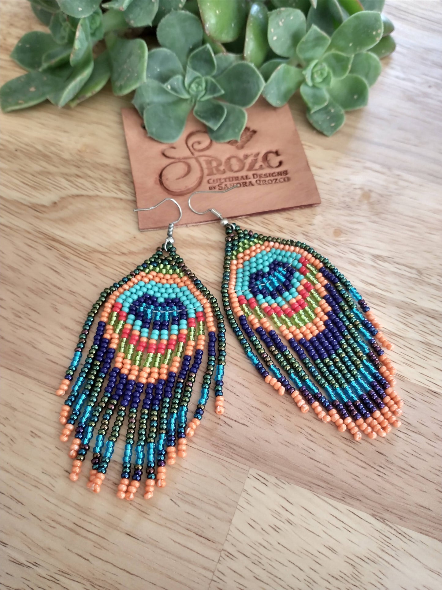 Peacock feather beaded earrings