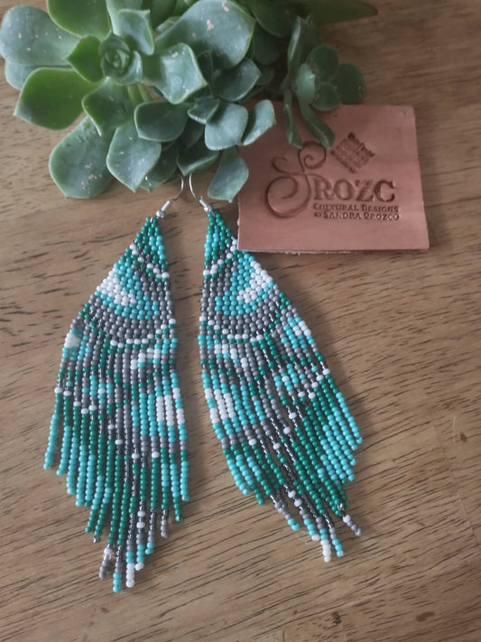 Blue/grey sneak skin pattern beaded earrings.