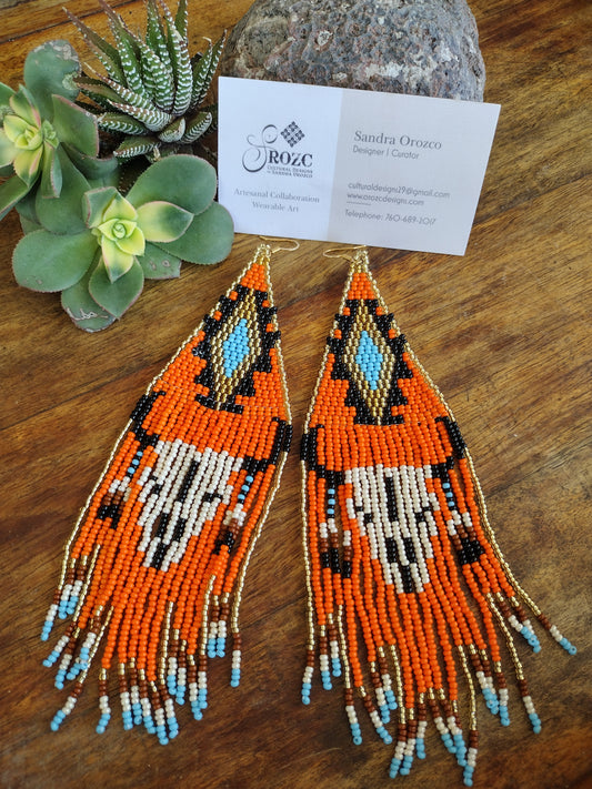 Tribal skull southwestern beaded earrings.