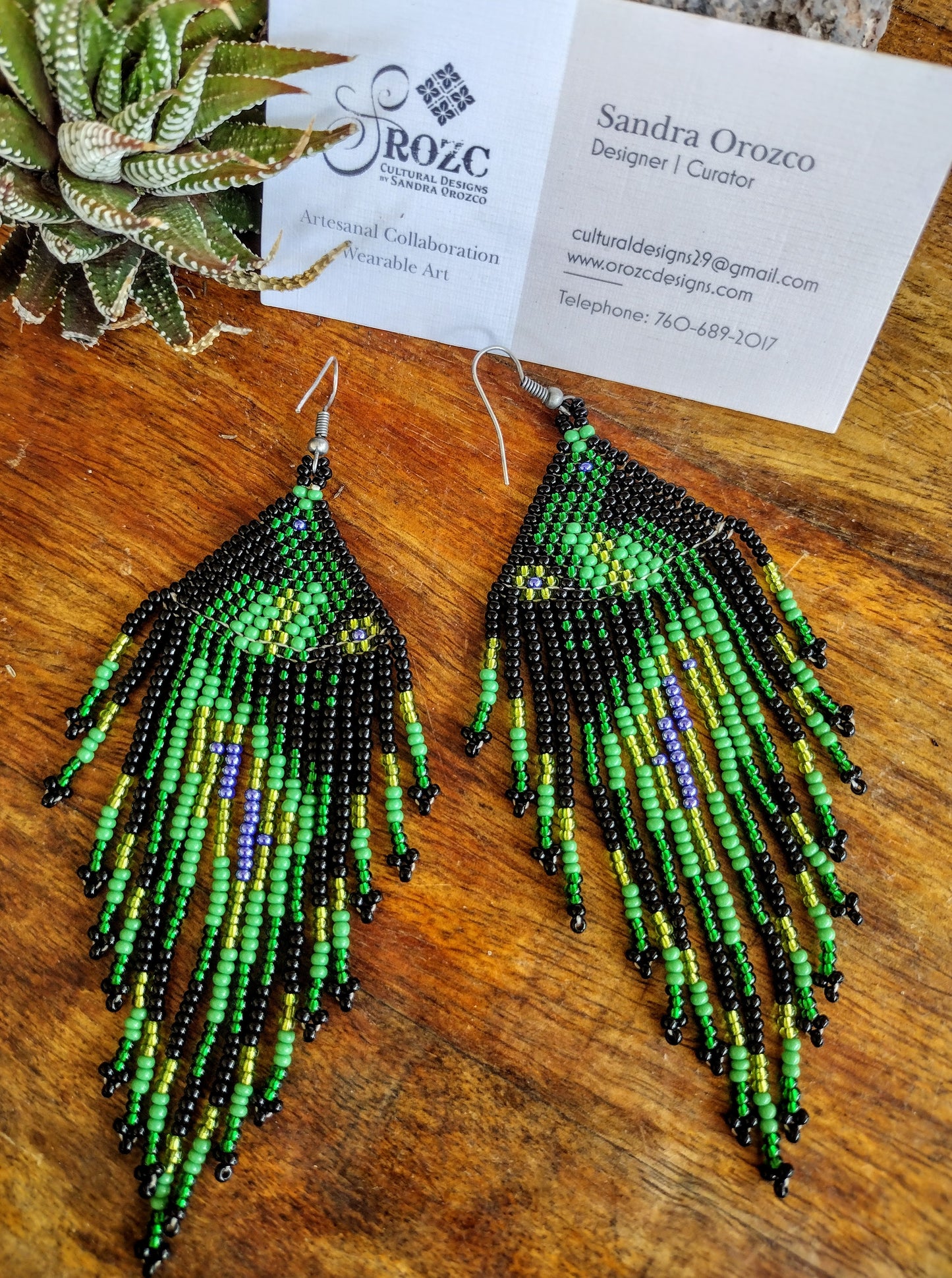 Green/black peacock beaded earrings