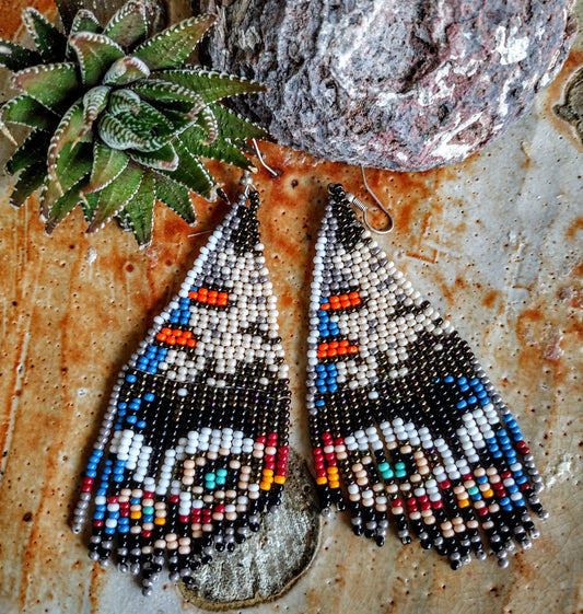 Beige/ brown butterfly wins beaded earrings