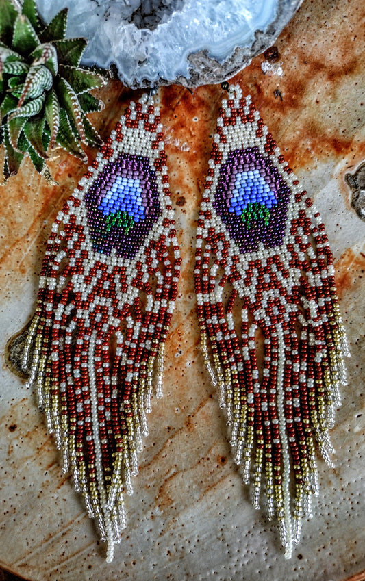 Long peacock feather blue earrings